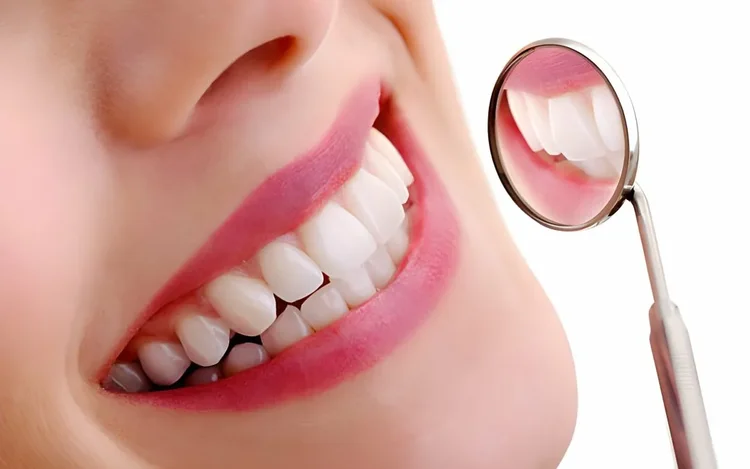 A picture of a woman with a white set of teeth